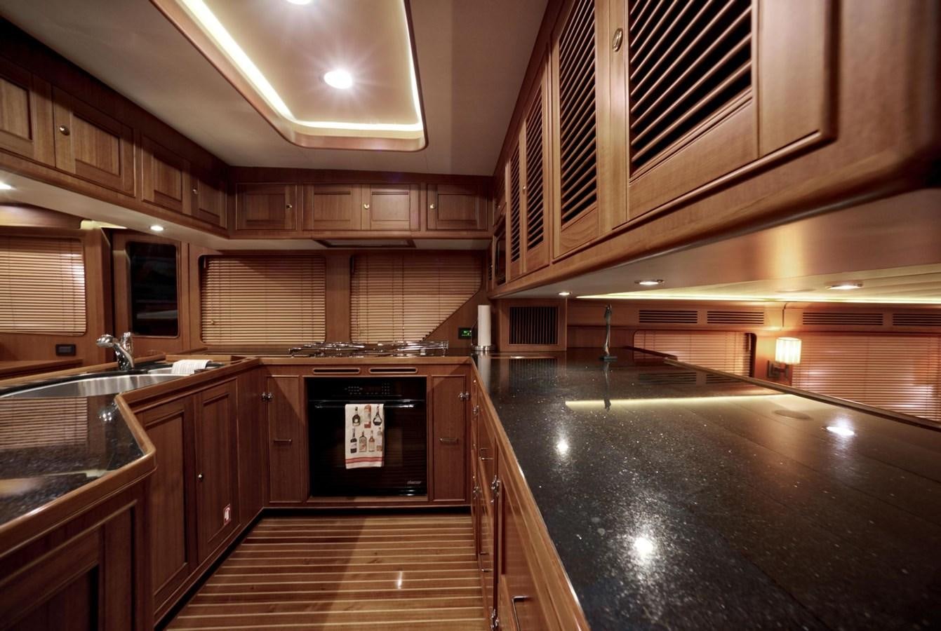a kitchen with a large oven aboard BEN'S BARGE Yacht for Sale