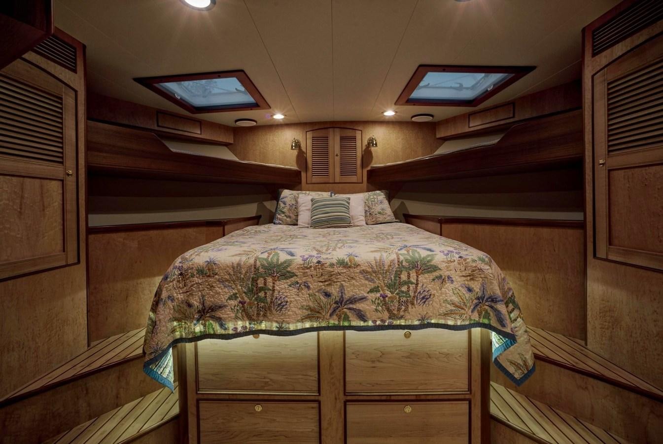 a bed in a cabin aboard BEN'S BARGE Yacht for Sale