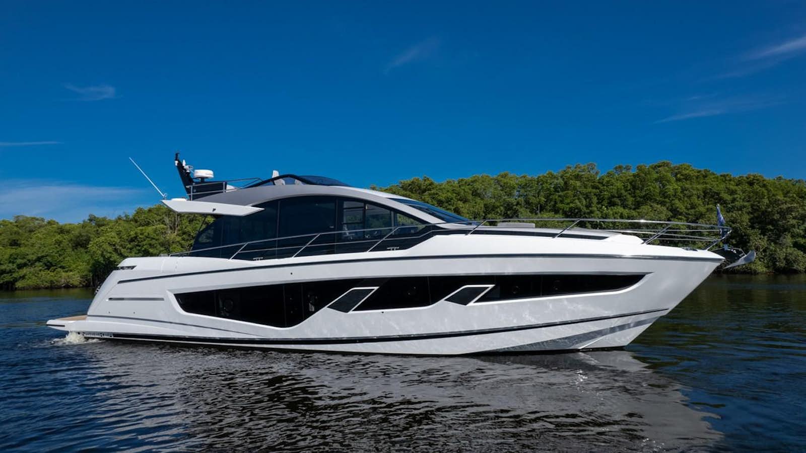 a boat on the water aboard 65 SPORT YACHT  Yacht for Sale