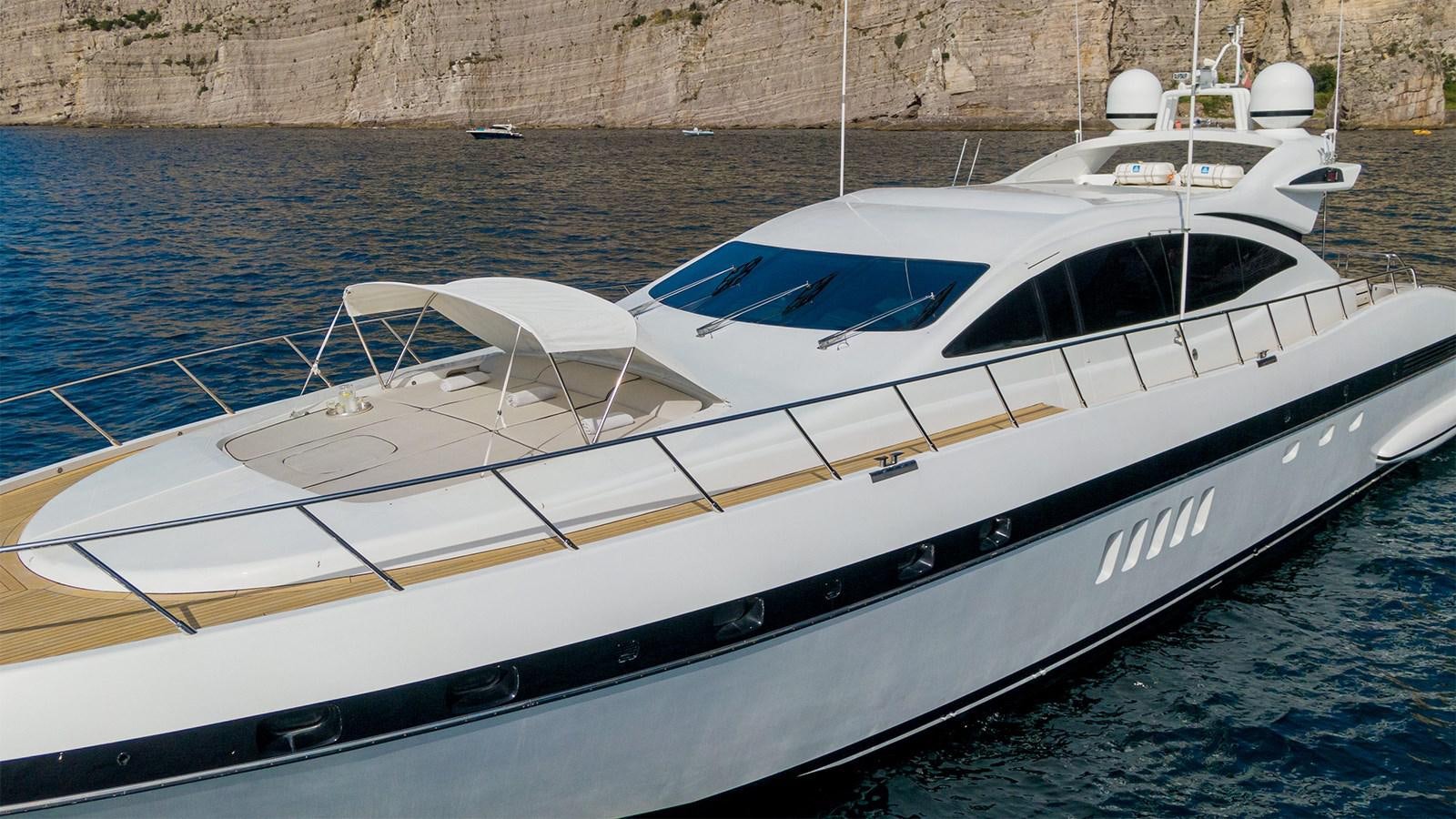 a white boat in the water aboard DEVA I Yacht for Sale