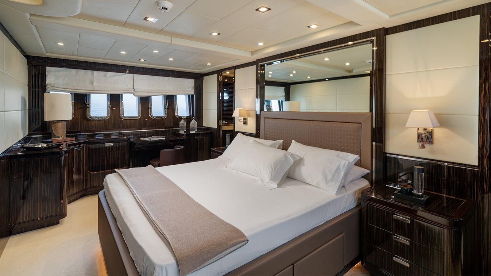 a hotel room with a bed aboard DEVA I Yacht for Sale