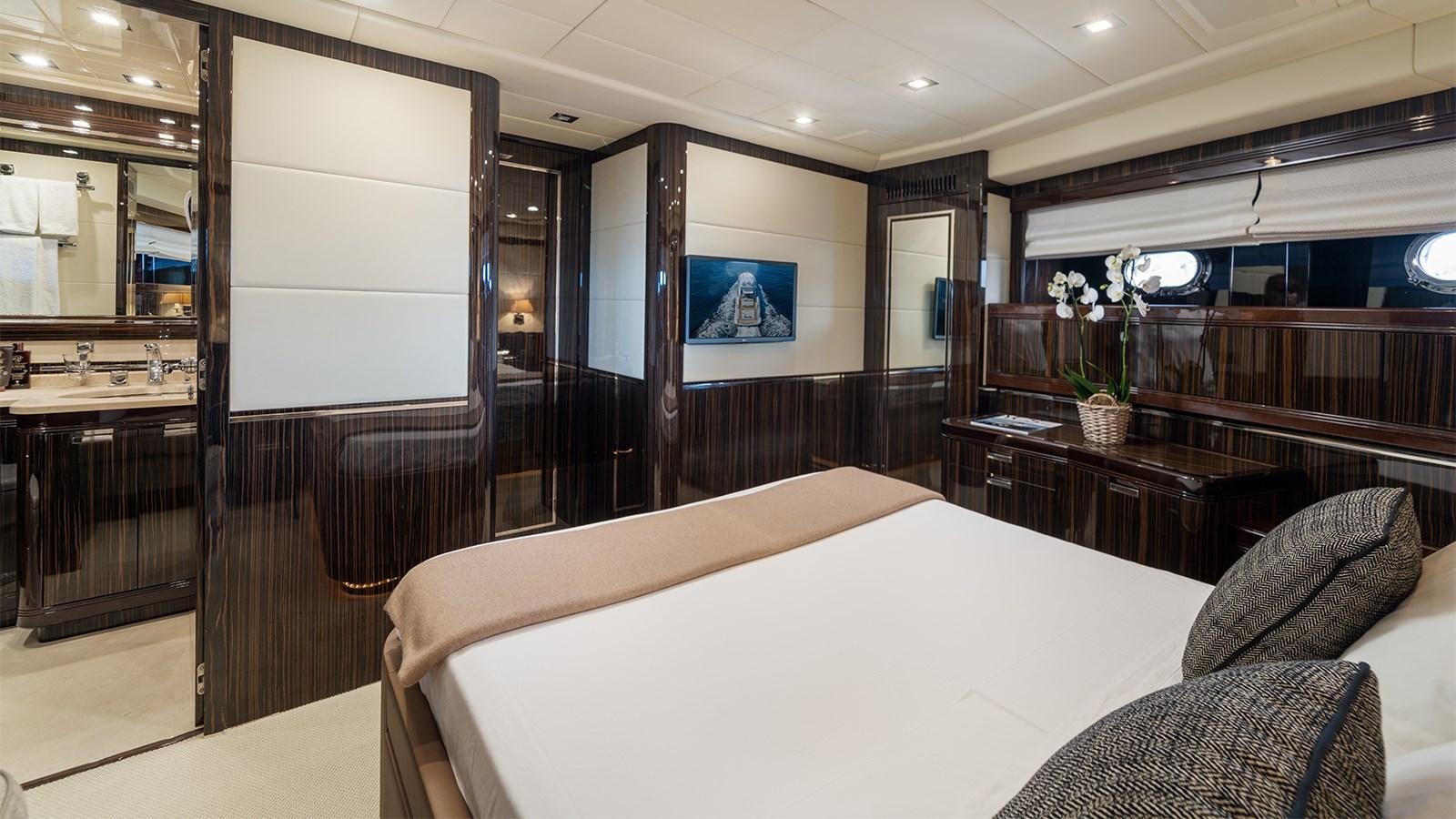 a hotel room with a bed aboard DEVA I Yacht for Sale