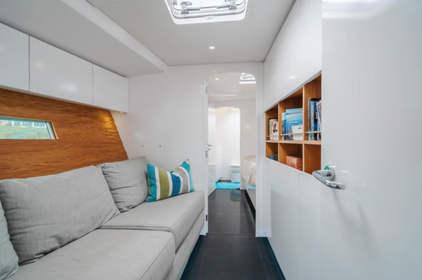 a couch in a room aboard AANDEEL Yacht for Sale