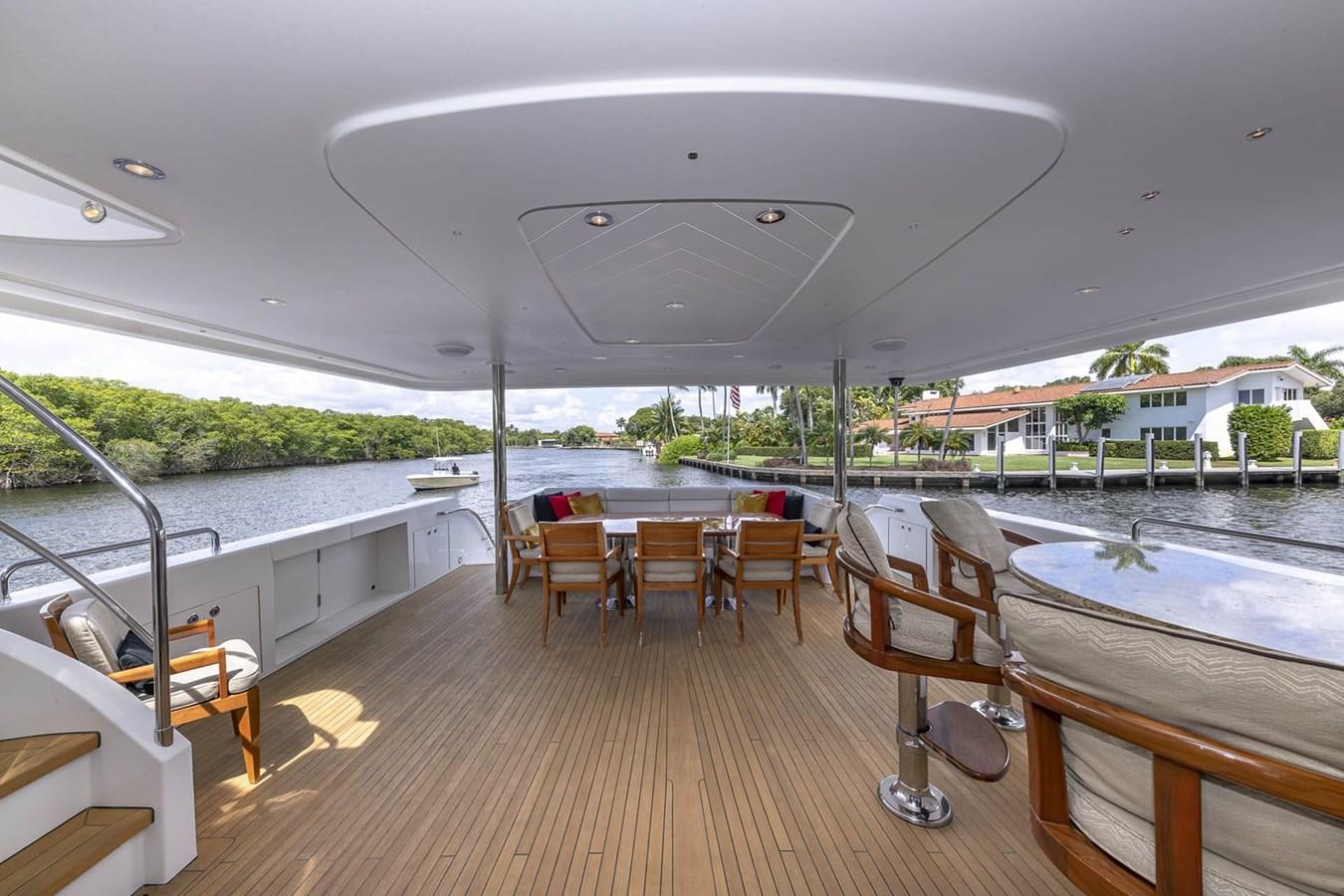 a room with a table and chairs aboard SIMPLICITY Yacht for Sale