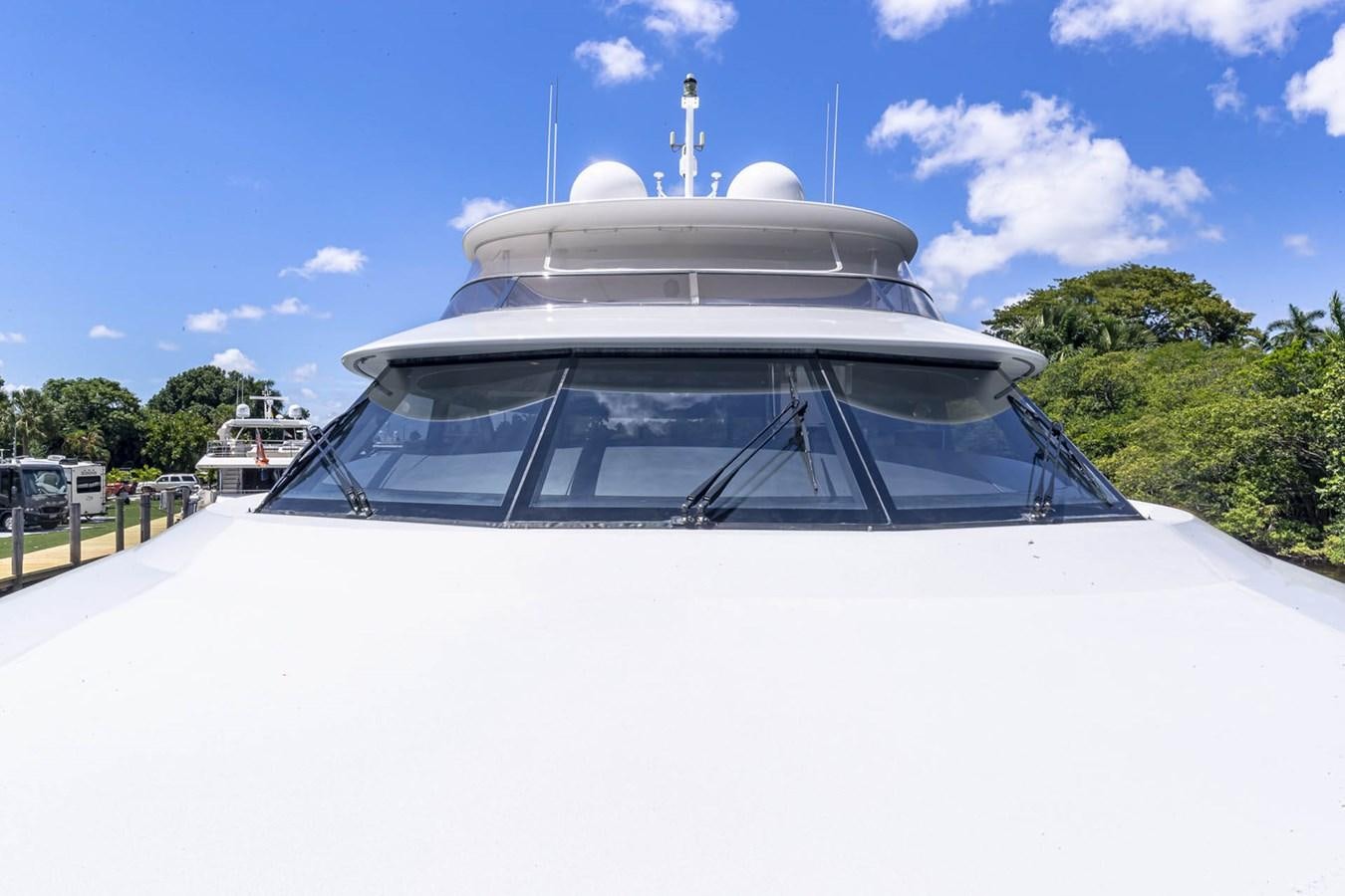 a white car with a dome roof aboard SIMPLICITY Yacht for Sale