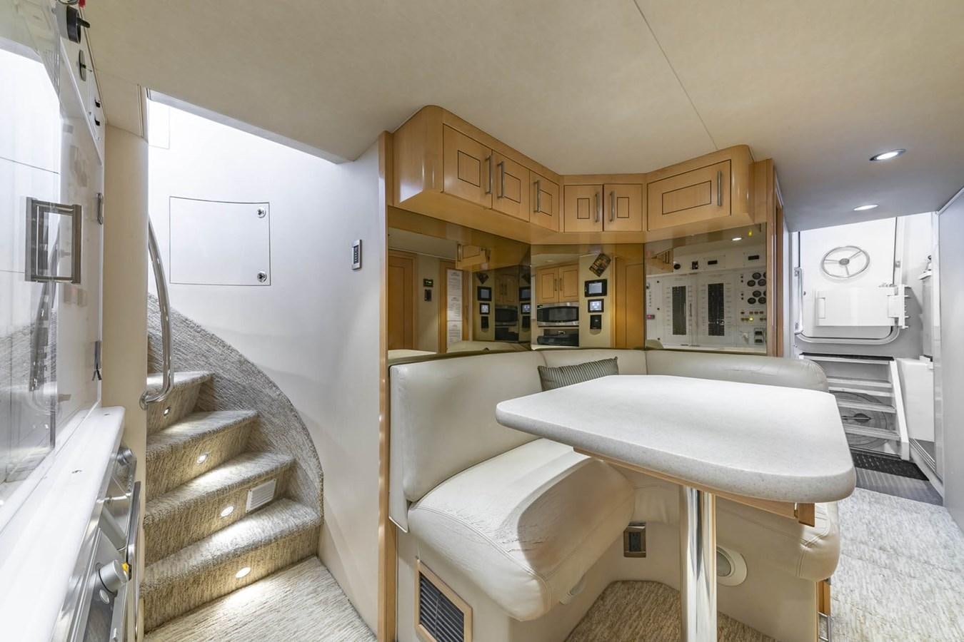 a bathroom with a tub and a staircase aboard SIMPLICITY Yacht for Sale