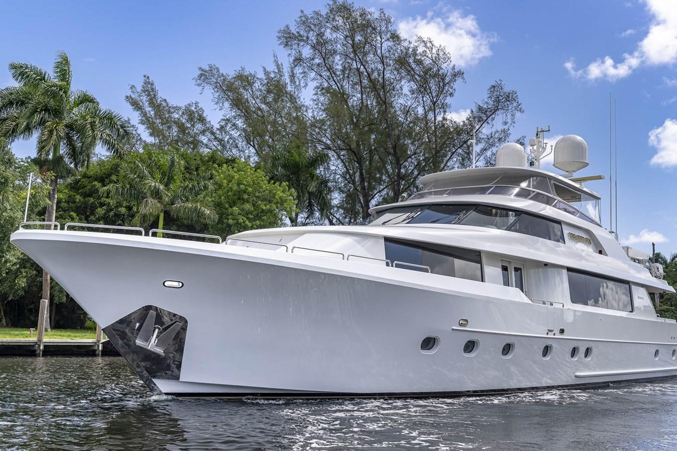 a white yacht on the water aboard SIMPLICITY Yacht for Sale