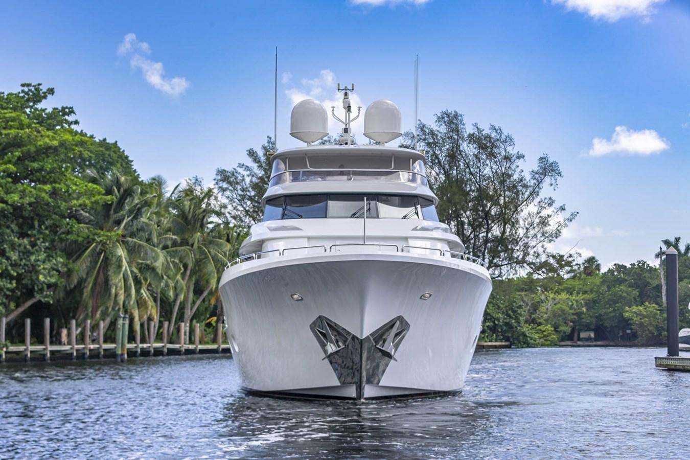a large white boat in the water aboard SIMPLICITY Yacht for Sale
