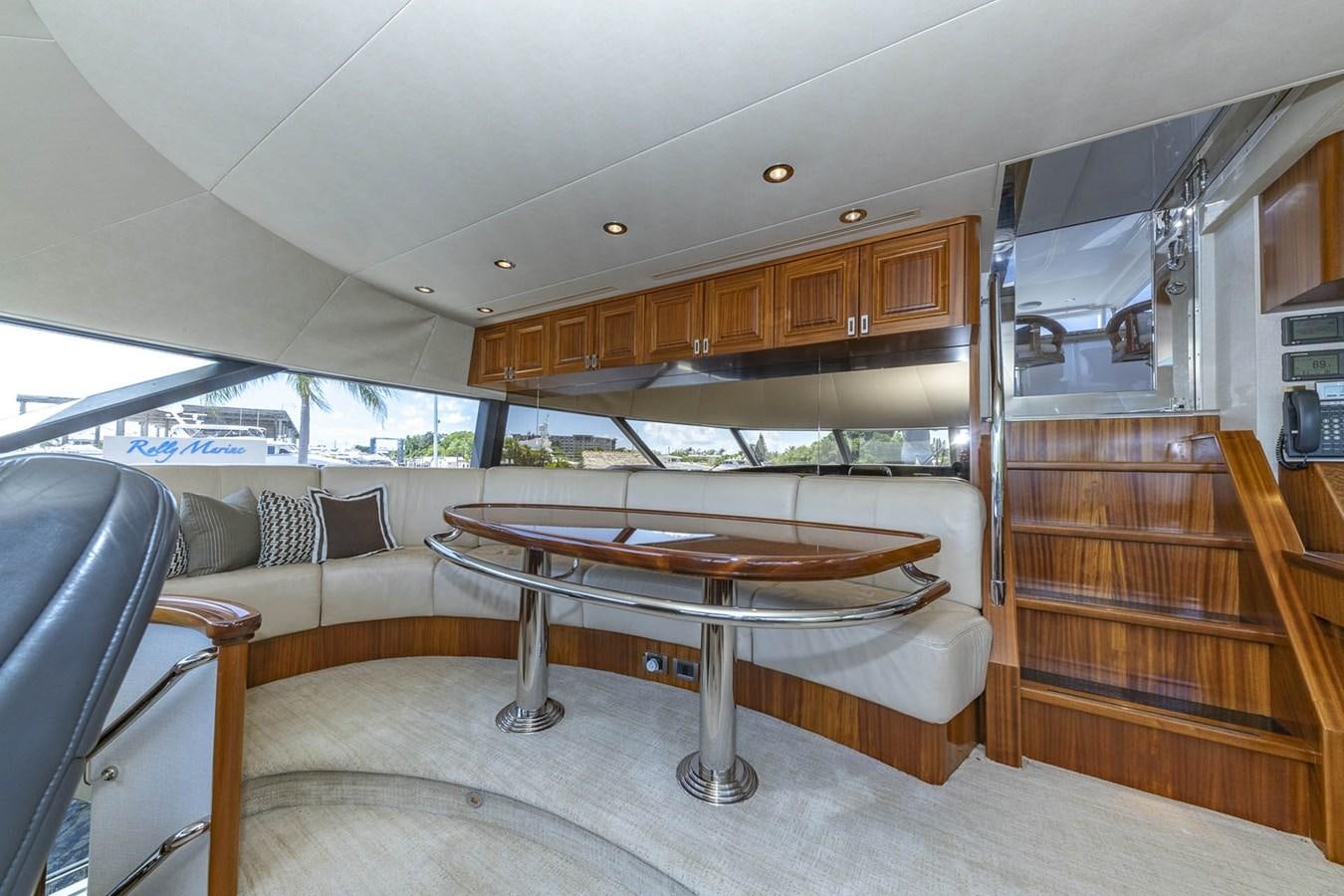 a room with a table and chairs aboard SIMPLICITY Yacht for Sale