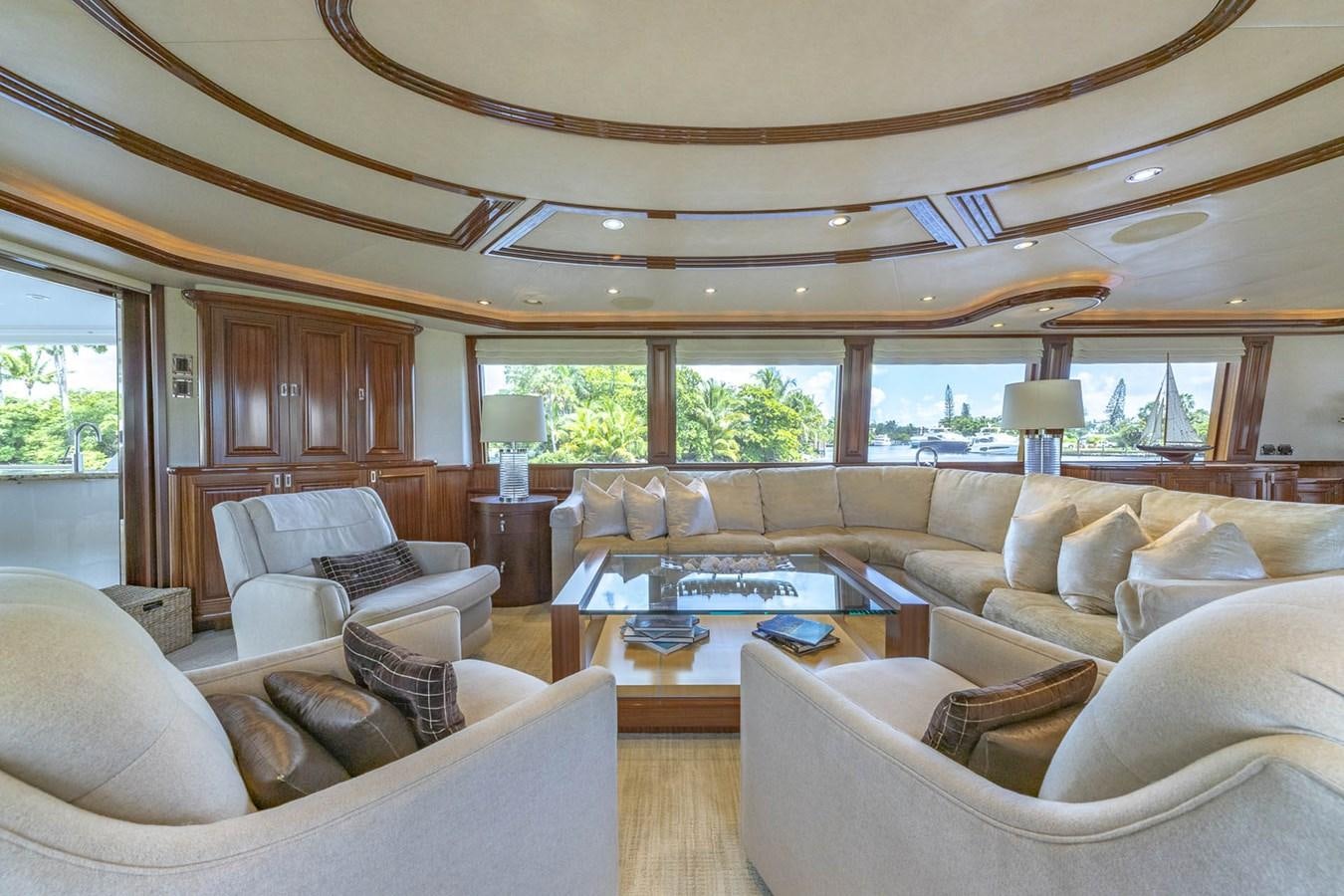 a living room with a large window aboard SIMPLICITY Yacht for Sale