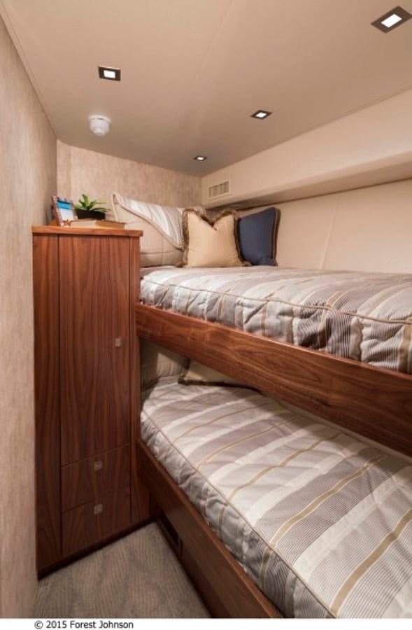 a room with two beds aboard NEW VIKING 80 SKYBRIDGE Yacht for Sale