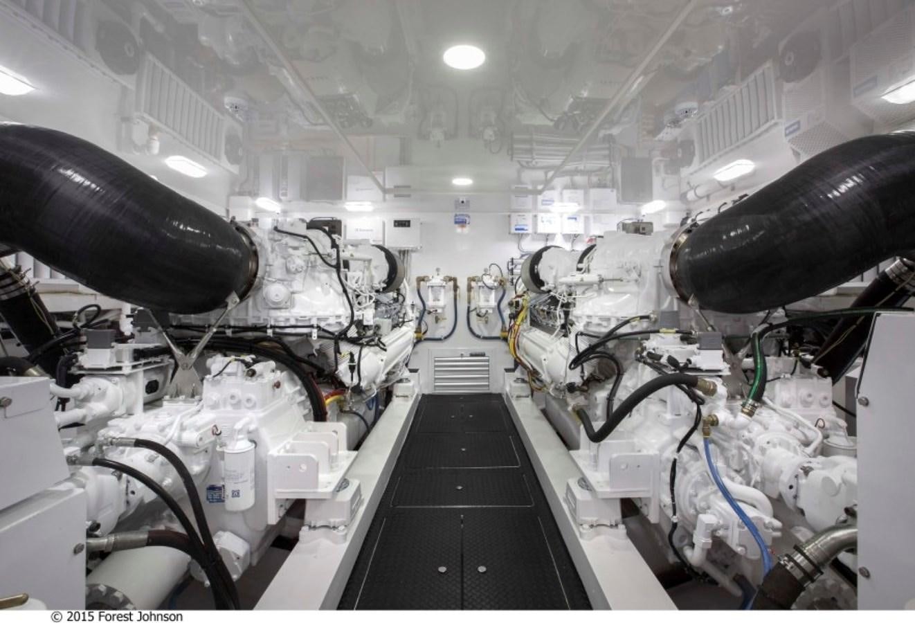 a large machine in a factory aboard NEW VIKING 80 SKYBRIDGE Yacht for Sale