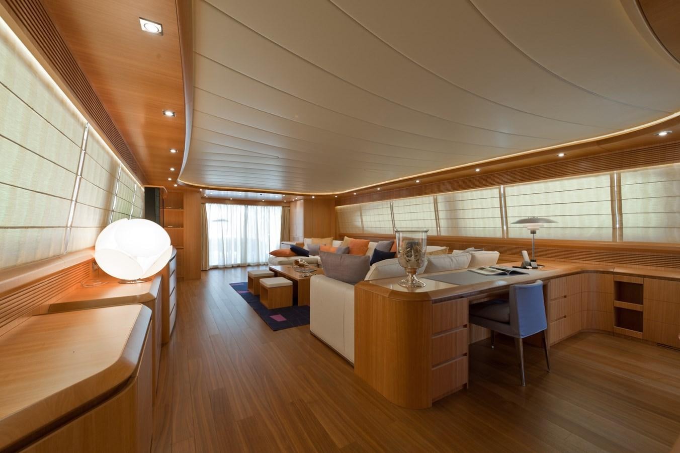 a room with a table and chairs aboard CYNTHIA Yacht for Sale