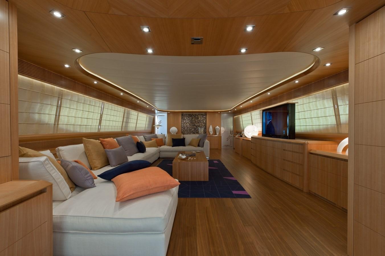 a room with a bed and a tv on the wall aboard CYNTHIA Yacht for Sale