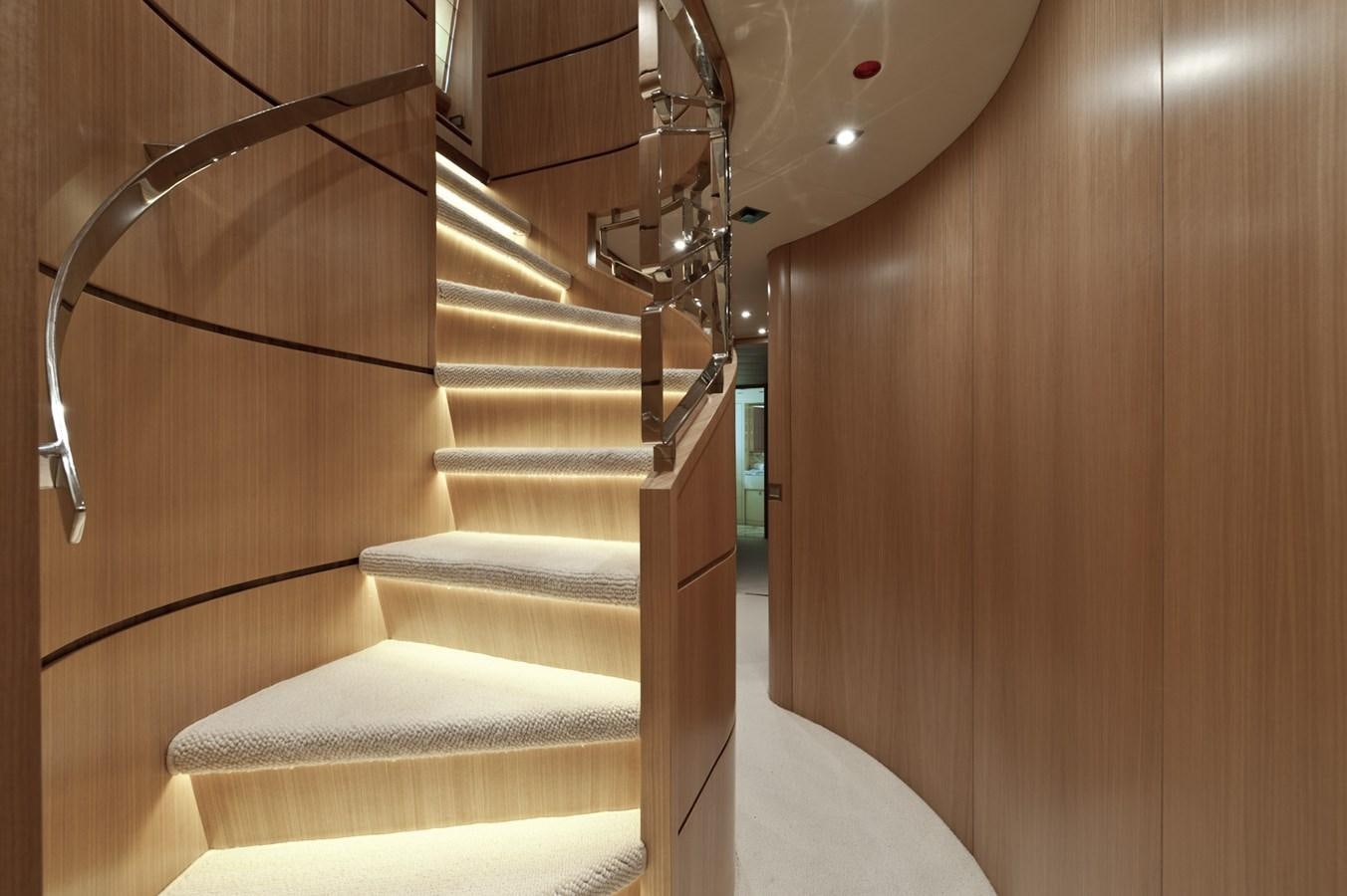 a staircase with a white carpet aboard CYNTHIA Yacht for Sale