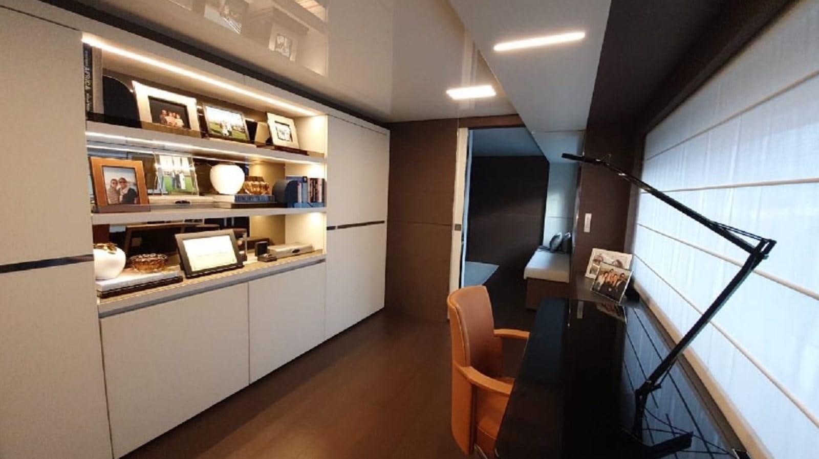 a room with a desk and a chair aboard WILLPOWER Yacht for Sale