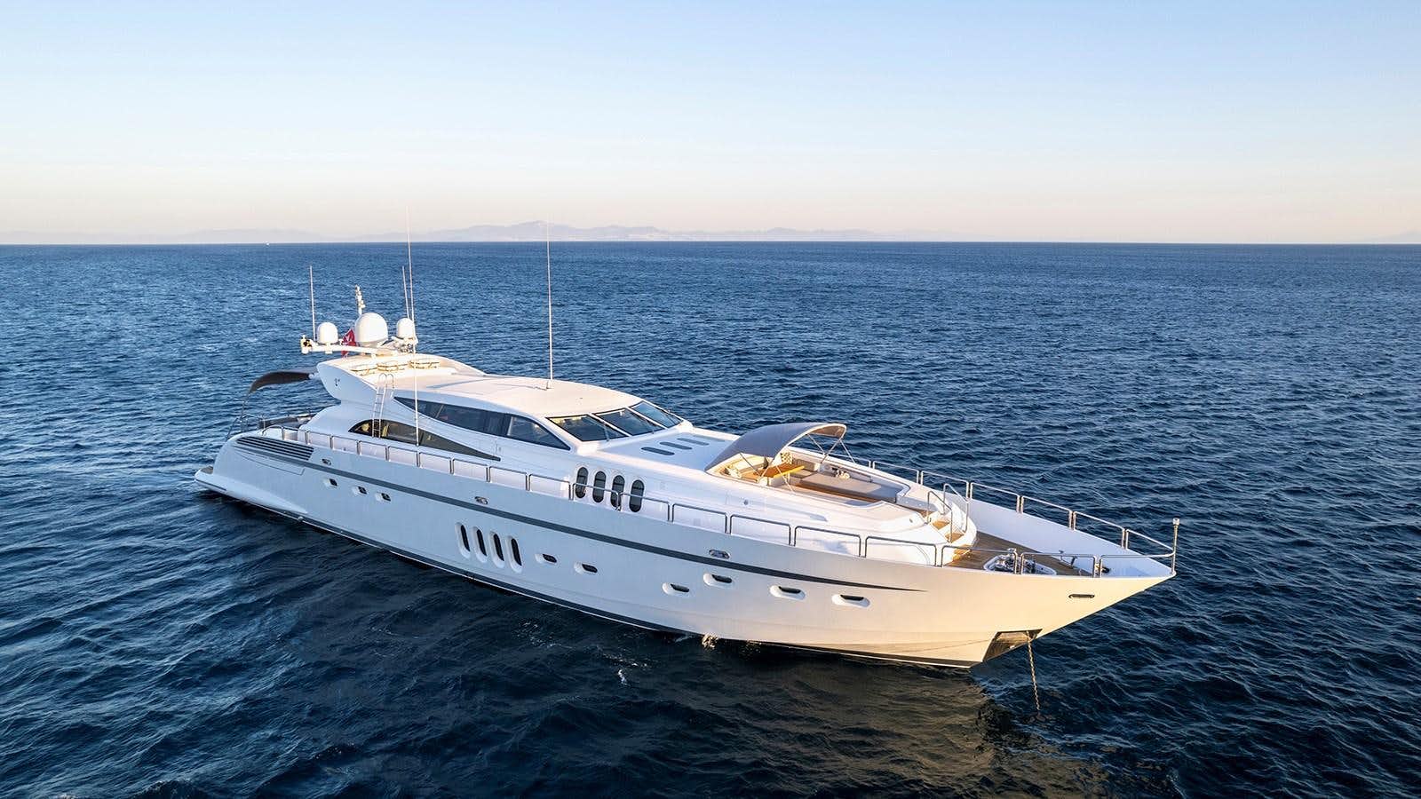 a white yacht in the water aboard KIDI ONE Yacht for Sale