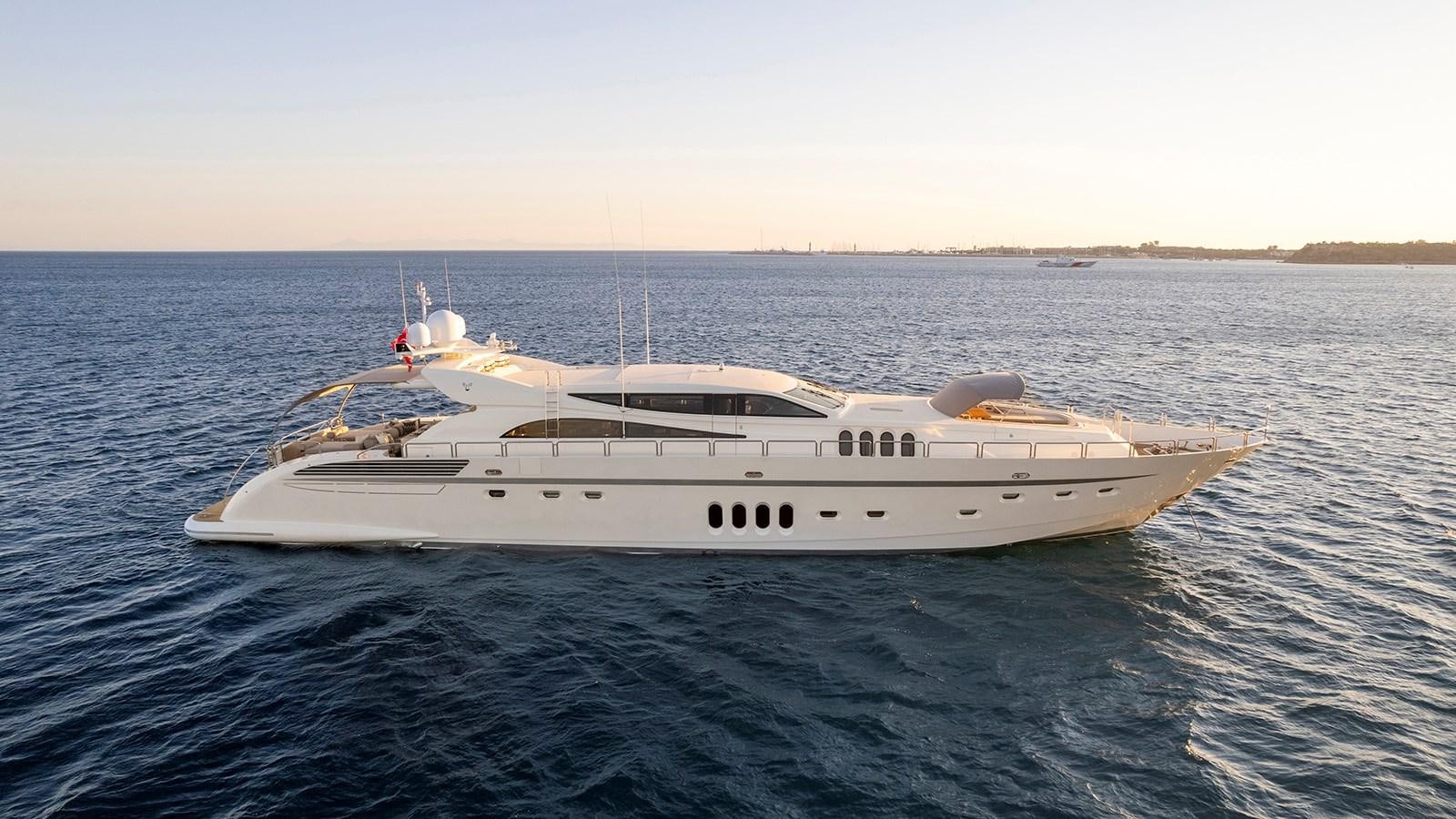 a white yacht in the water aboard KIDI ONE Yacht for Sale