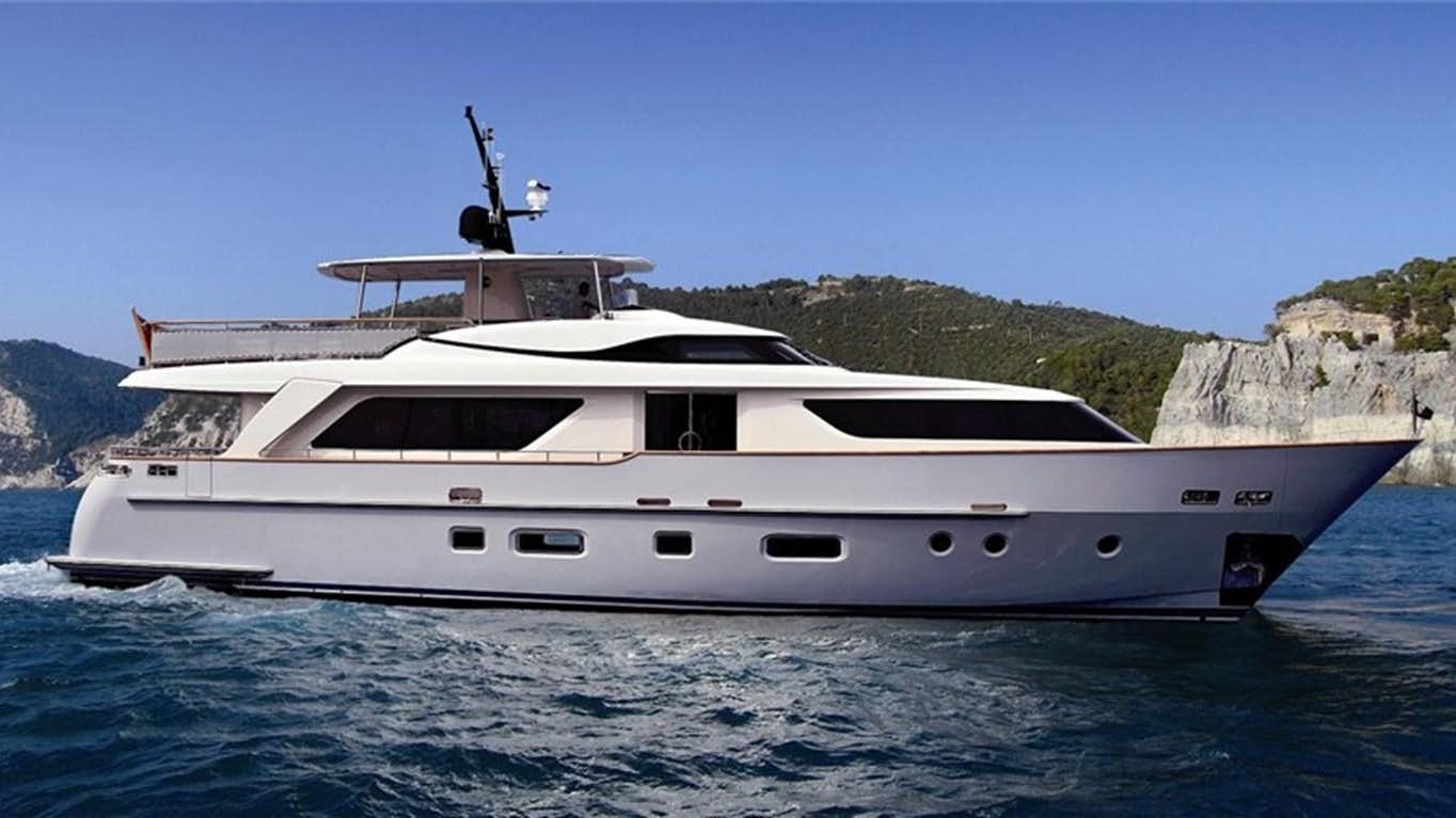 a white yacht on the water aboard ELYSIUM Yacht for Sale