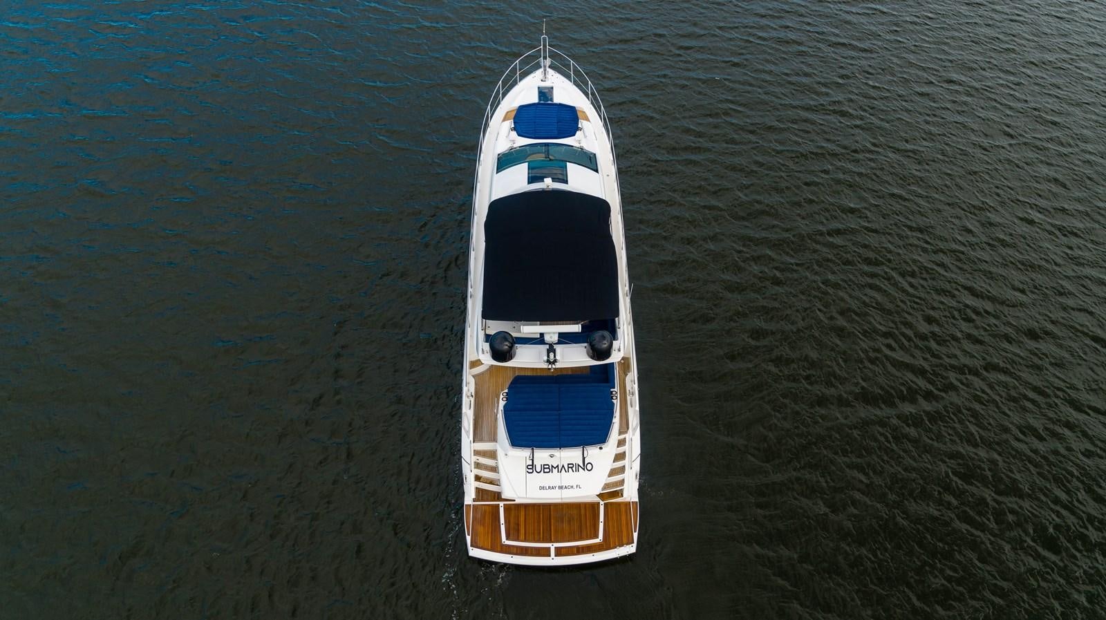 a white and black boat in the water aboard SUBMARINO Yacht for Sale