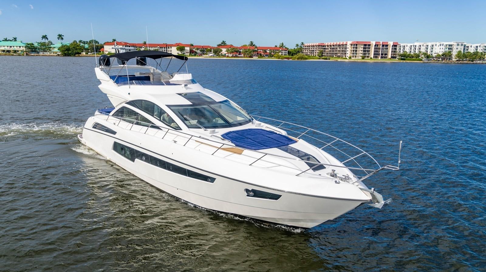 a white yacht on the water aboard SUBMARINO Yacht for Sale