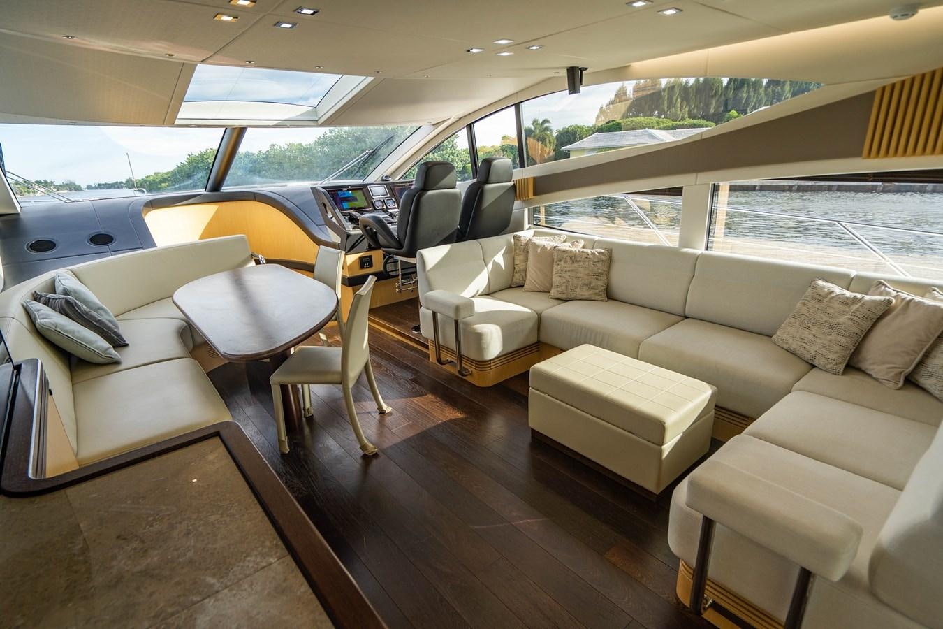 a living room with a couch and a table aboard SUBMARINO Yacht for Sale