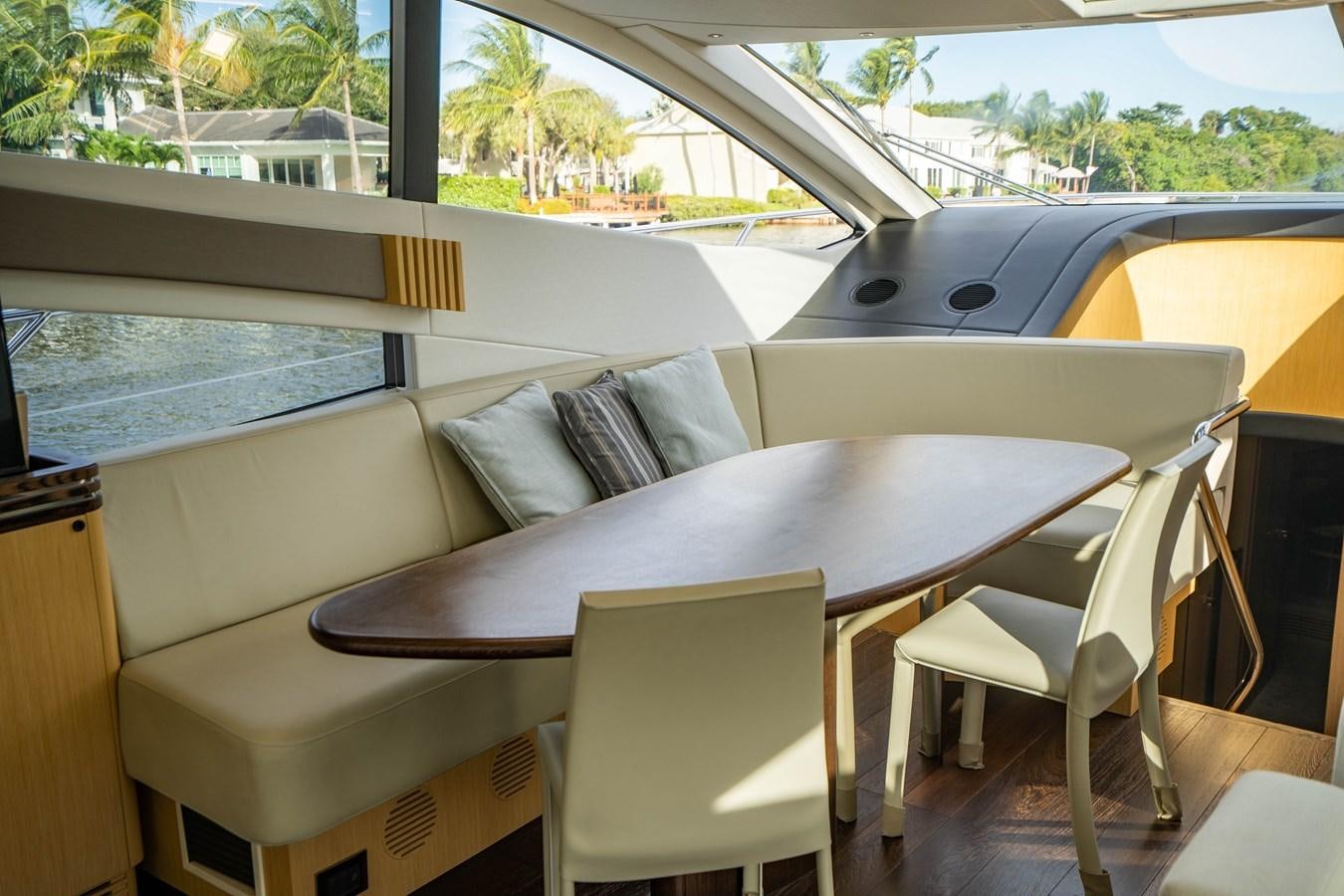 a table and chairs in a room aboard SUBMARINO Yacht for Sale