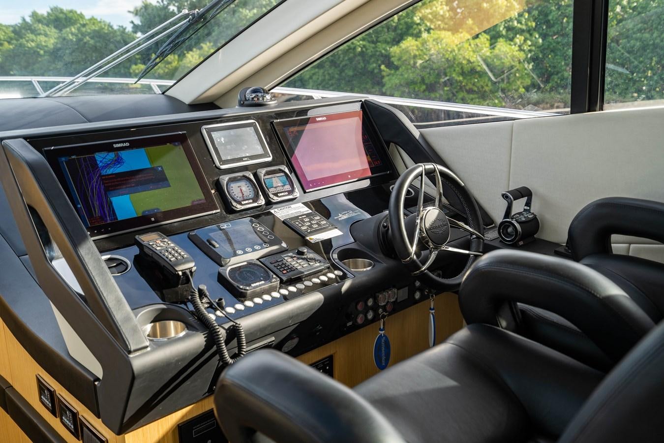 inside of a car aboard SUBMARINO Yacht for Sale