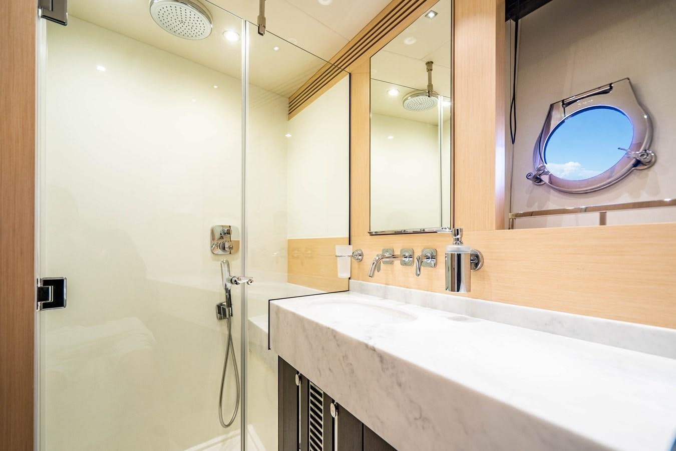 a bathroom with a bathtub and a sink aboard SUBMARINO Yacht for Sale