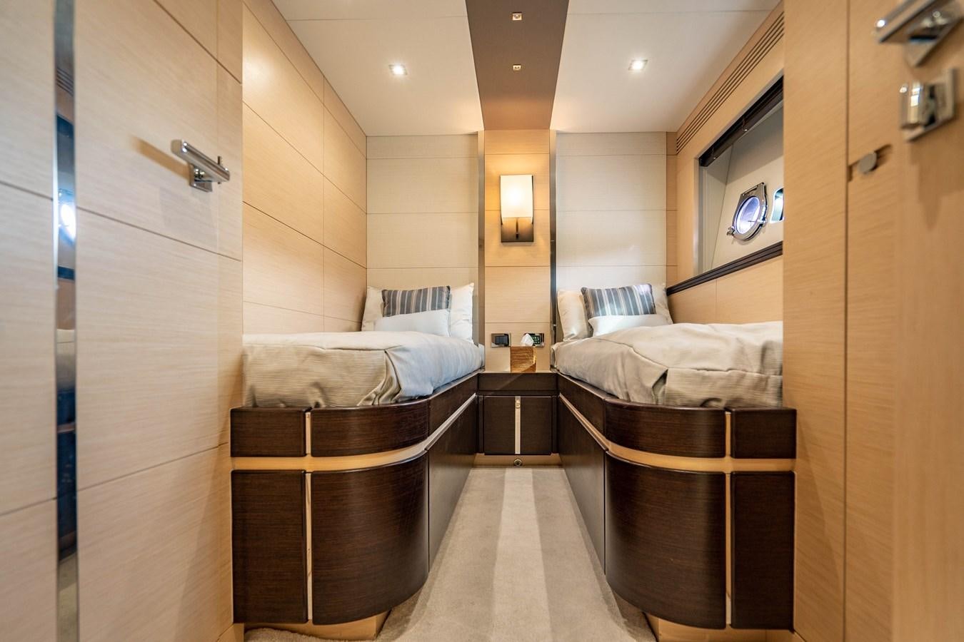 a room with a bed and a mirror aboard SUBMARINO Yacht for Sale