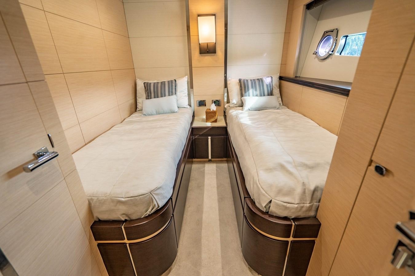 a room with a bed and a mirror aboard SUBMARINO Yacht for Sale