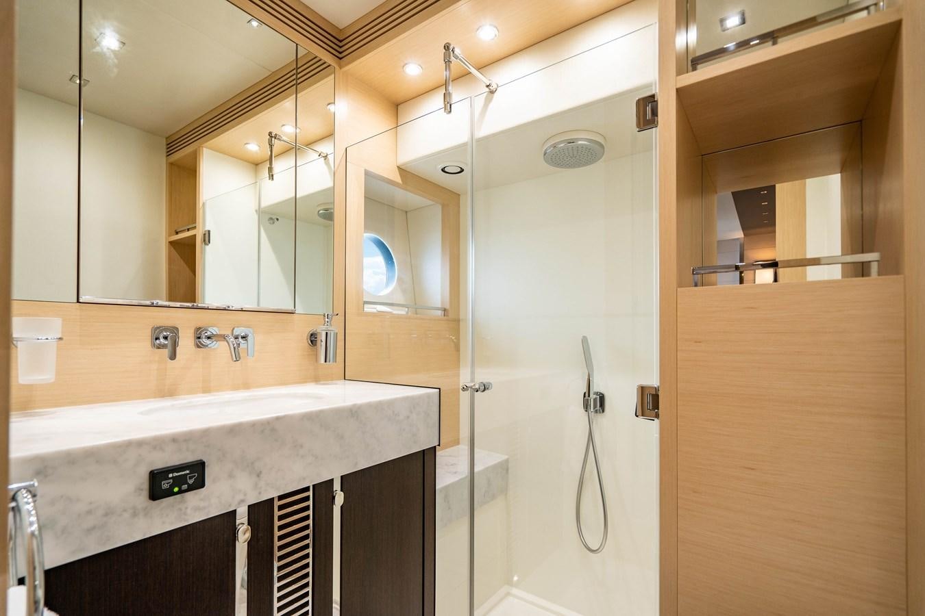 a bathroom with a shower unit and sink aboard SUBMARINO Yacht for Sale