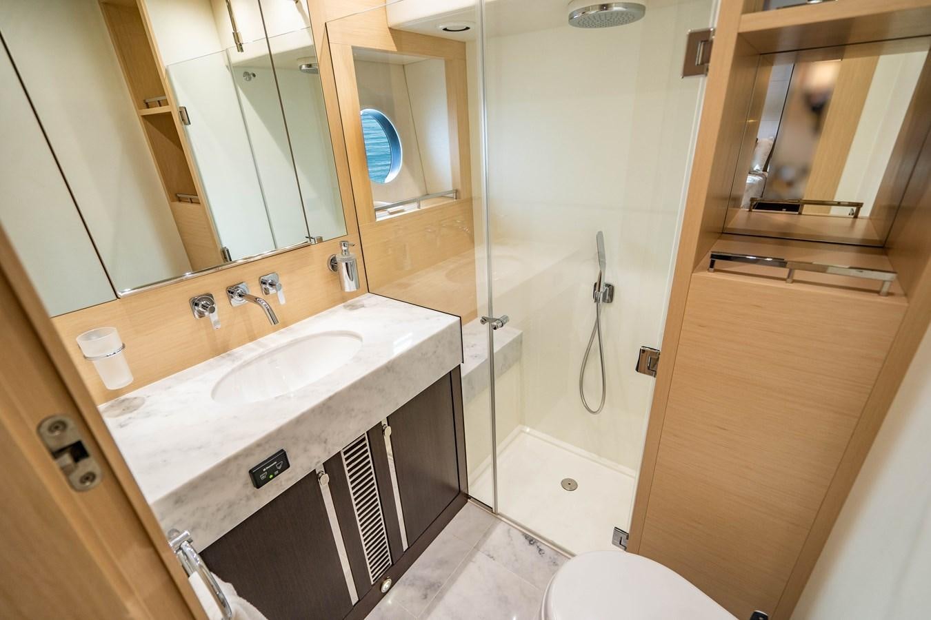 a bathroom with a sink and a shower aboard SUBMARINO Yacht for Sale