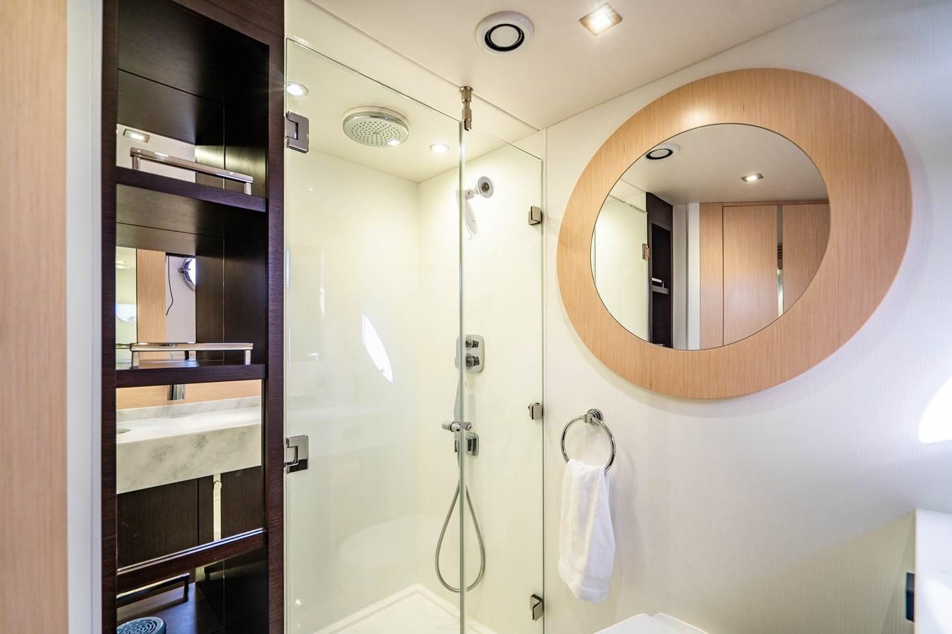 a bathroom with a glass shower aboard SUBMARINO Yacht for Sale