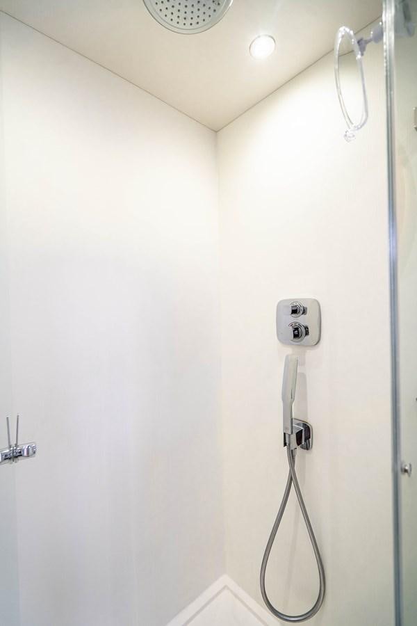 a white wall with a telephone and a white wall aboard SUBMARINO Yacht for Sale