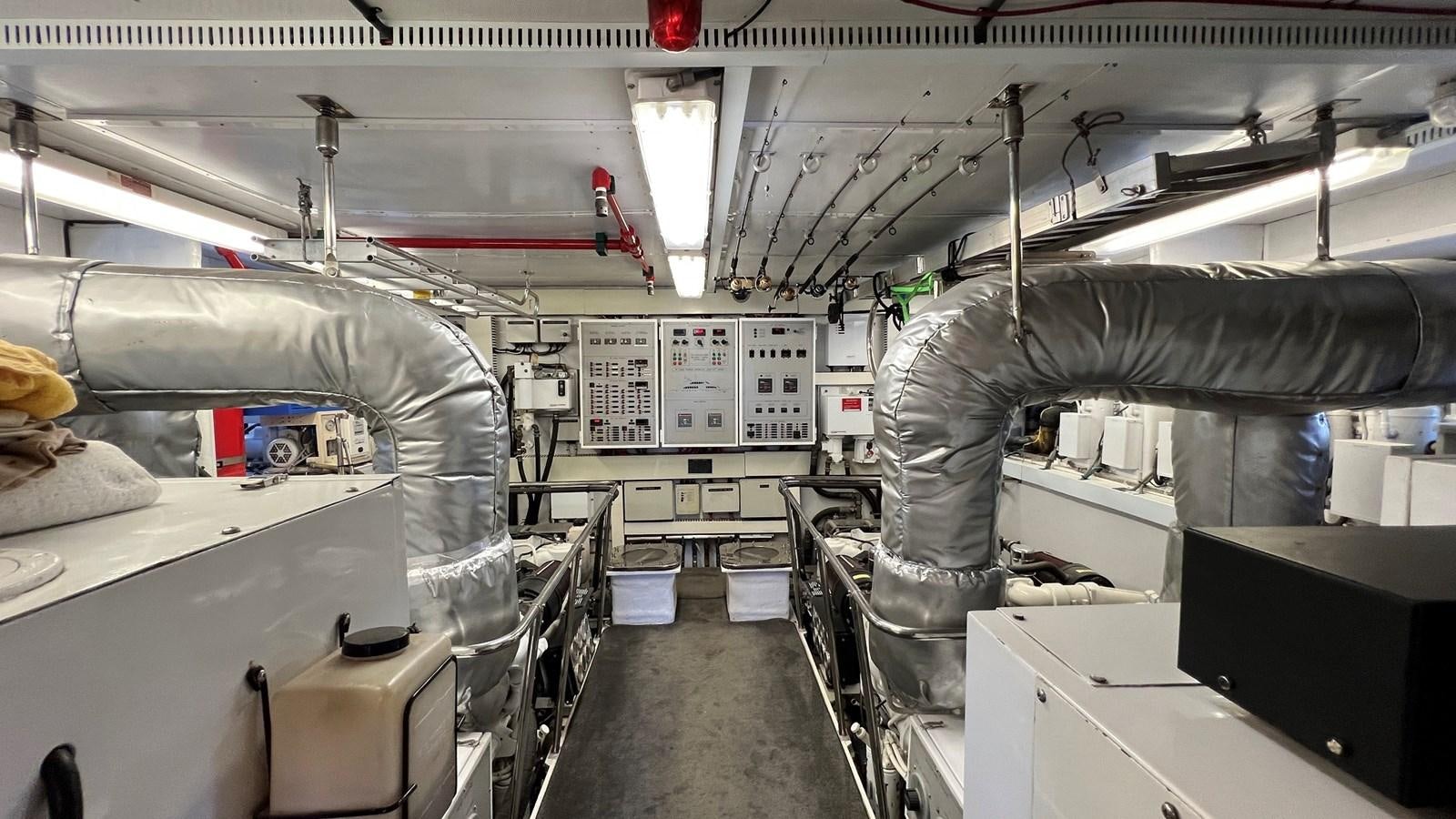 a room with several machines aboard MISSY B II Yacht for Sale
