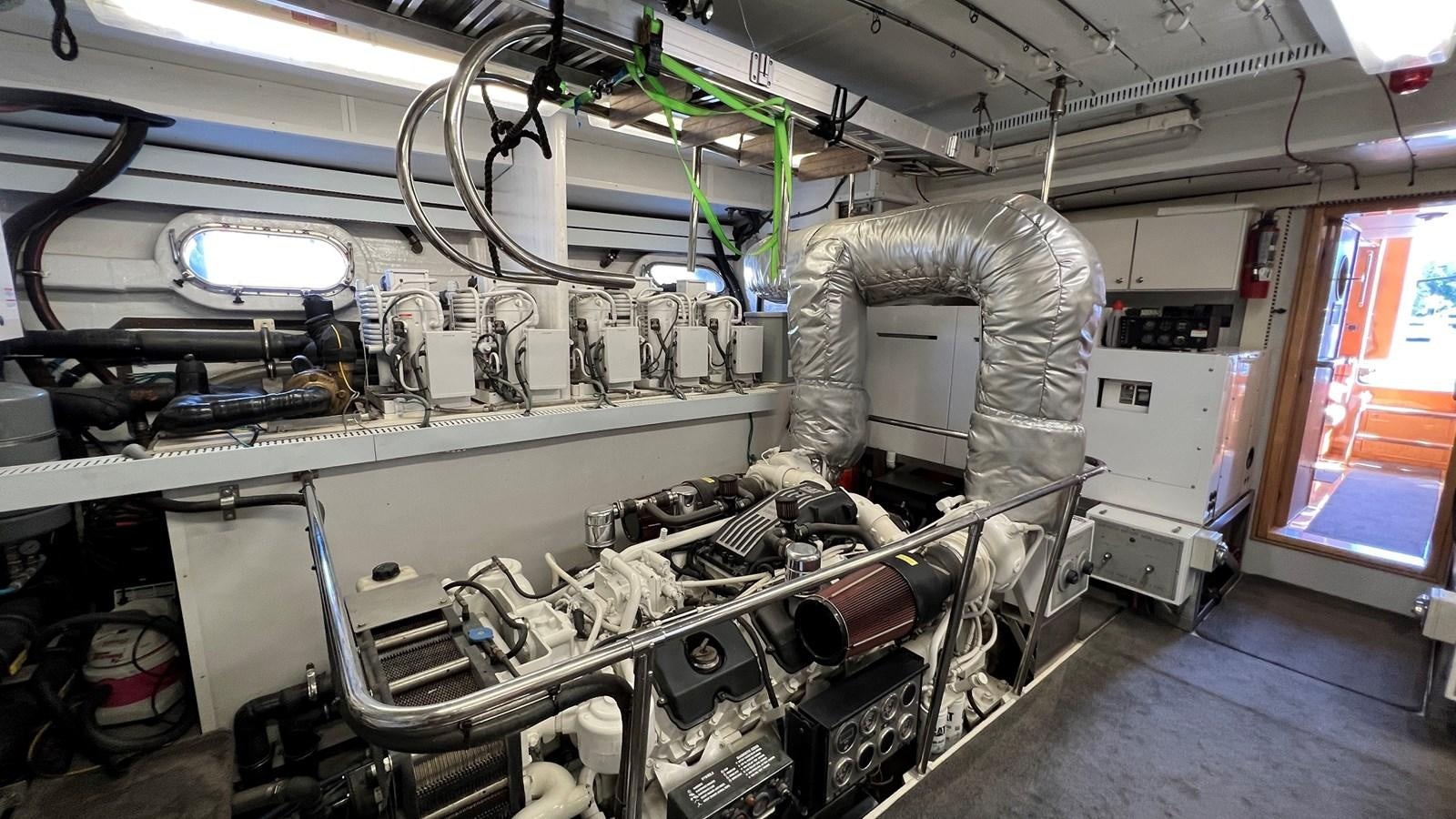 a person working in a factory aboard MISSY B II Yacht for Sale