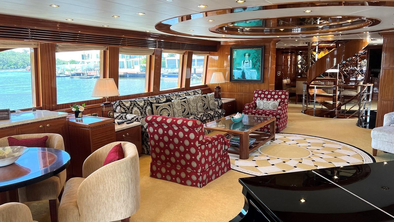 a living room with a large window aboard MISSY B II Yacht for Sale