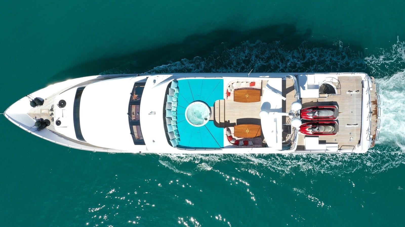 a white vehicle in the water aboard MISSY B II Yacht for Sale