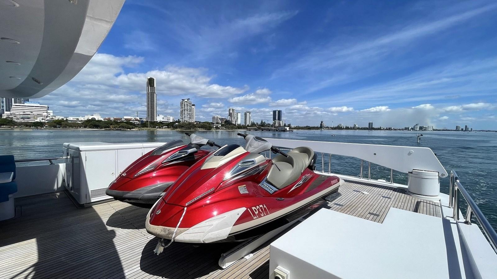 a couple of boats on a deck aboard MISSY B II Yacht for Sale