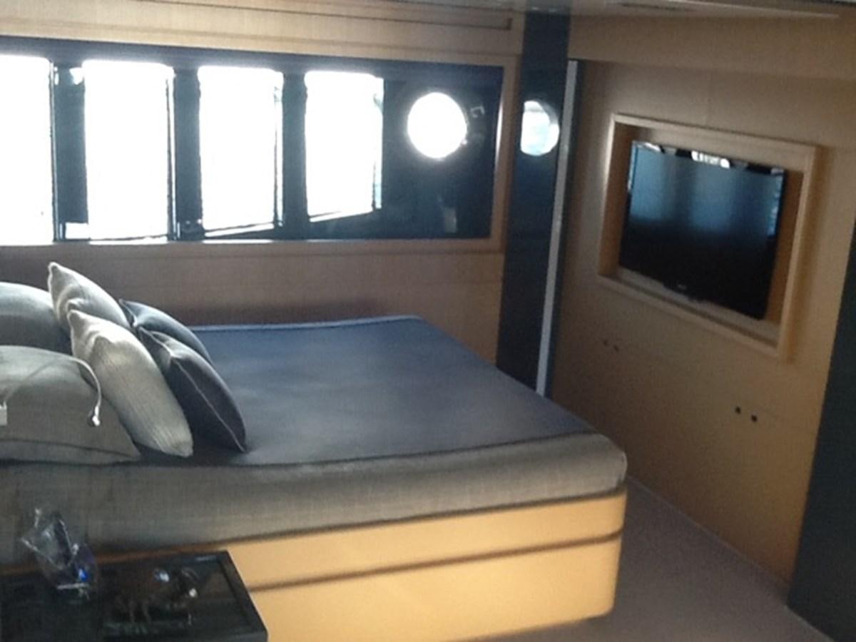 a couch in a room aboard LMPG Yacht for Sale