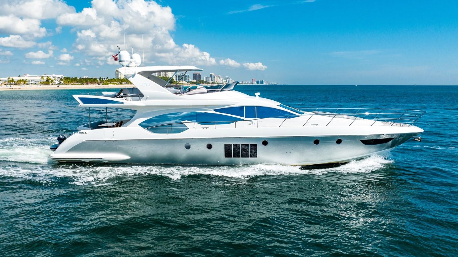 a white yacht in the water aboard DAYS LIKE THIS Yacht for Sale