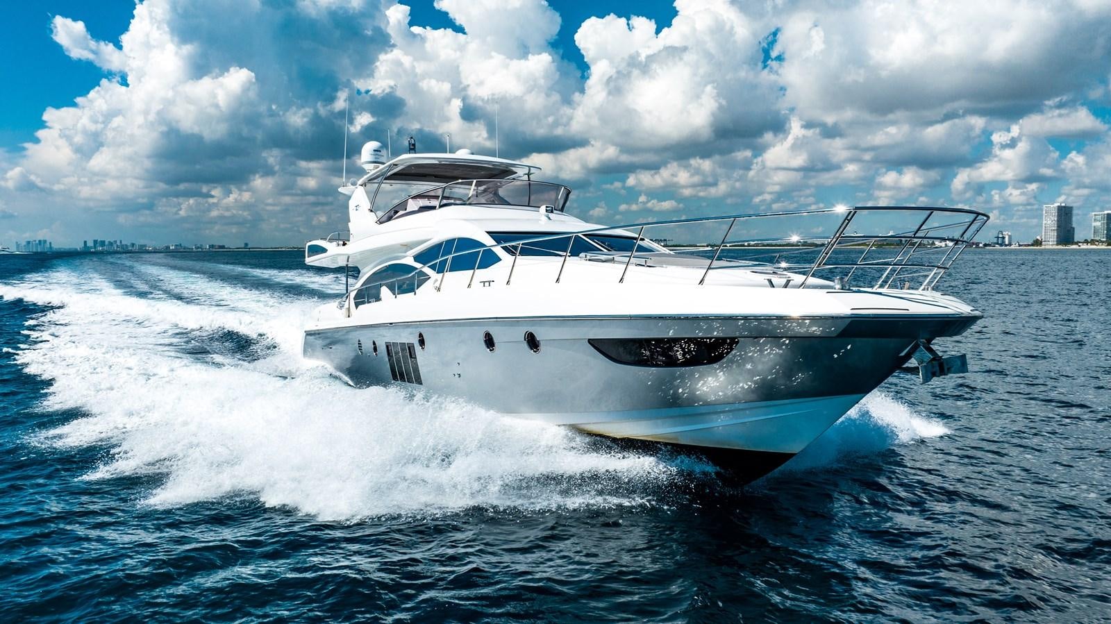 a white yacht on the water aboard DAYS LIKE THIS Yacht for Sale