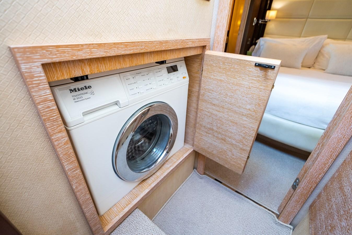 a white washing machine aboard DAYS LIKE THIS Yacht for Sale