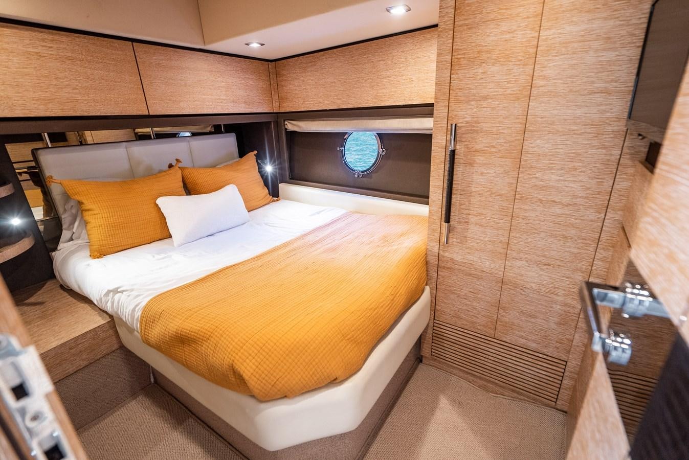 a bed in a room aboard DAYS LIKE THIS Yacht for Sale