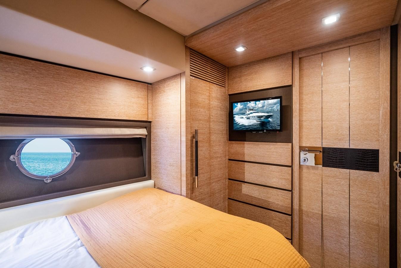 a tv on a wall aboard DAYS LIKE THIS Yacht for Sale