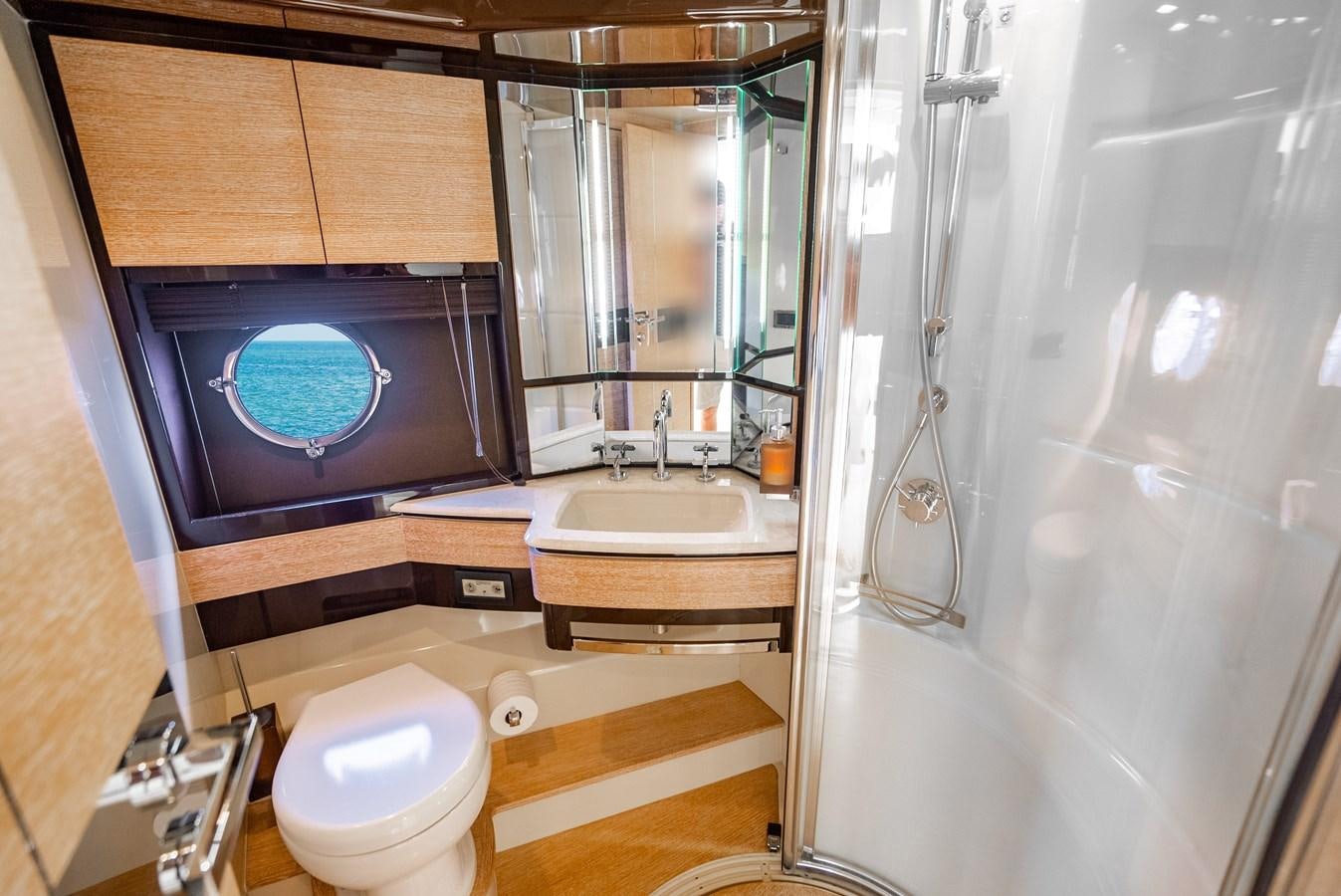a bathroom with a large mirror aboard DAYS LIKE THIS Yacht for Sale