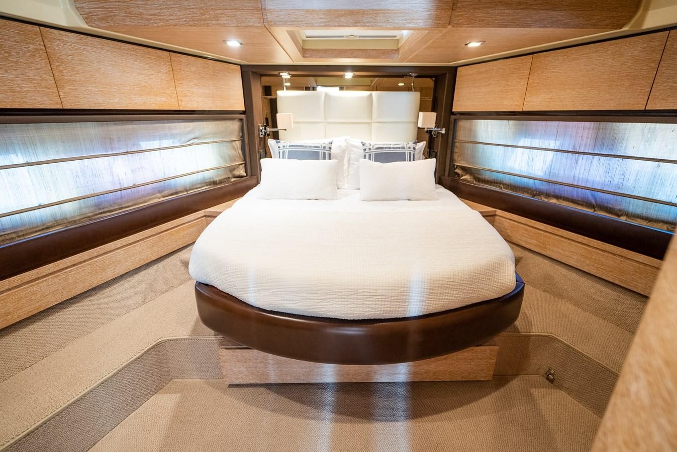 a bed in a room aboard DAYS LIKE THIS Yacht for Sale