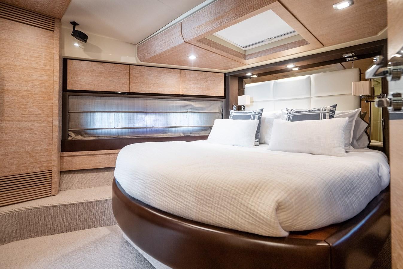 a bed in a room aboard DAYS LIKE THIS Yacht for Sale