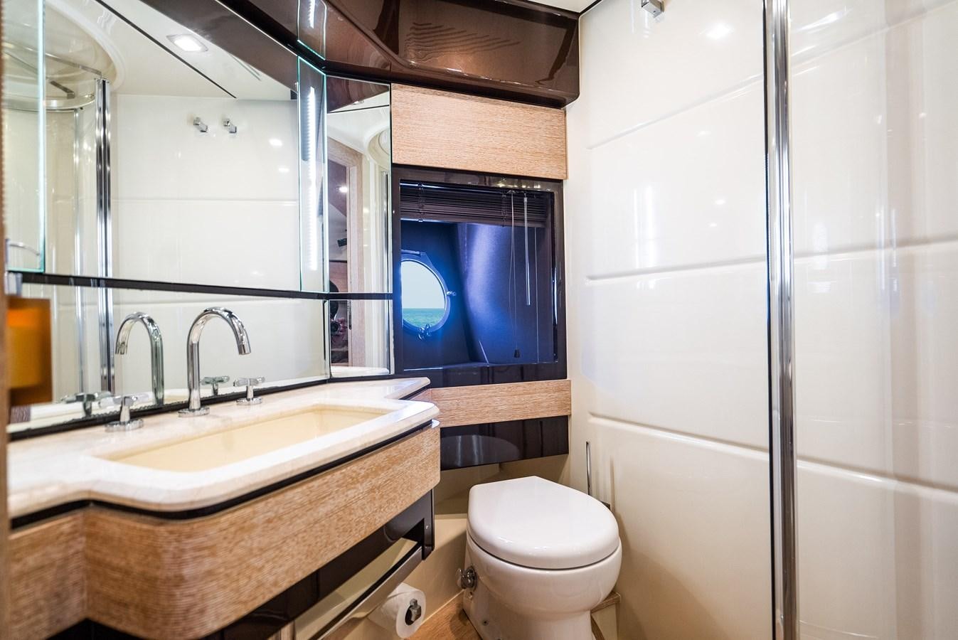 a bathroom with a sink and a toilet aboard DAYS LIKE THIS Yacht for Sale
